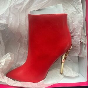 Shoe Dazzle Red Heeled Ankle Boots with Gold Accent